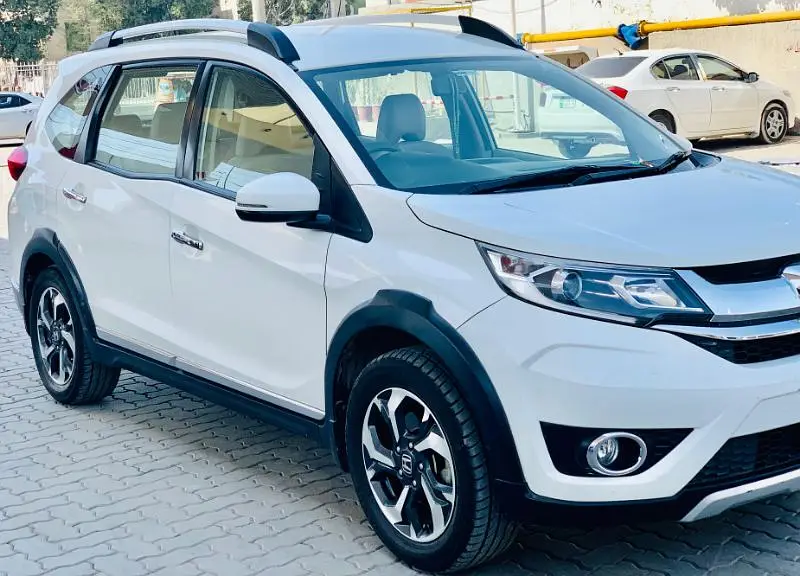 White BR-V driving in Lahore streets
