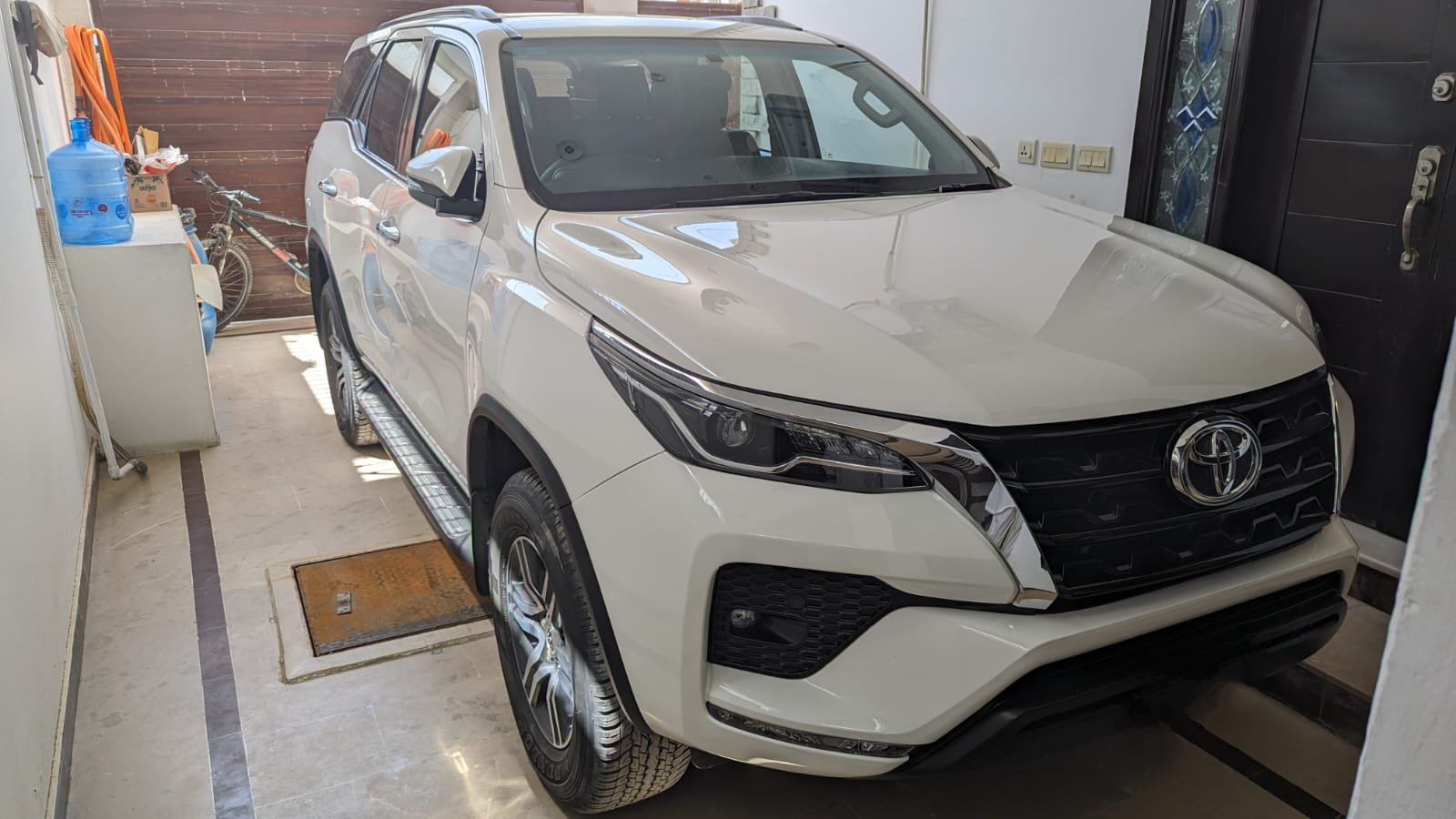 Professional security driver with armored Fortuner